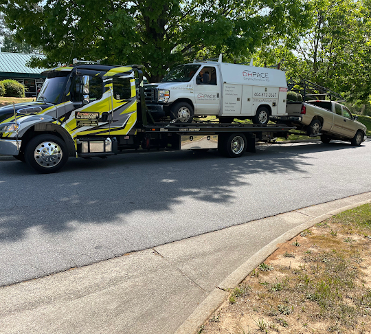 Truck on a Truck: The Best Towing Service